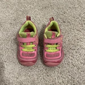 Pink Pediped tennis shoes.